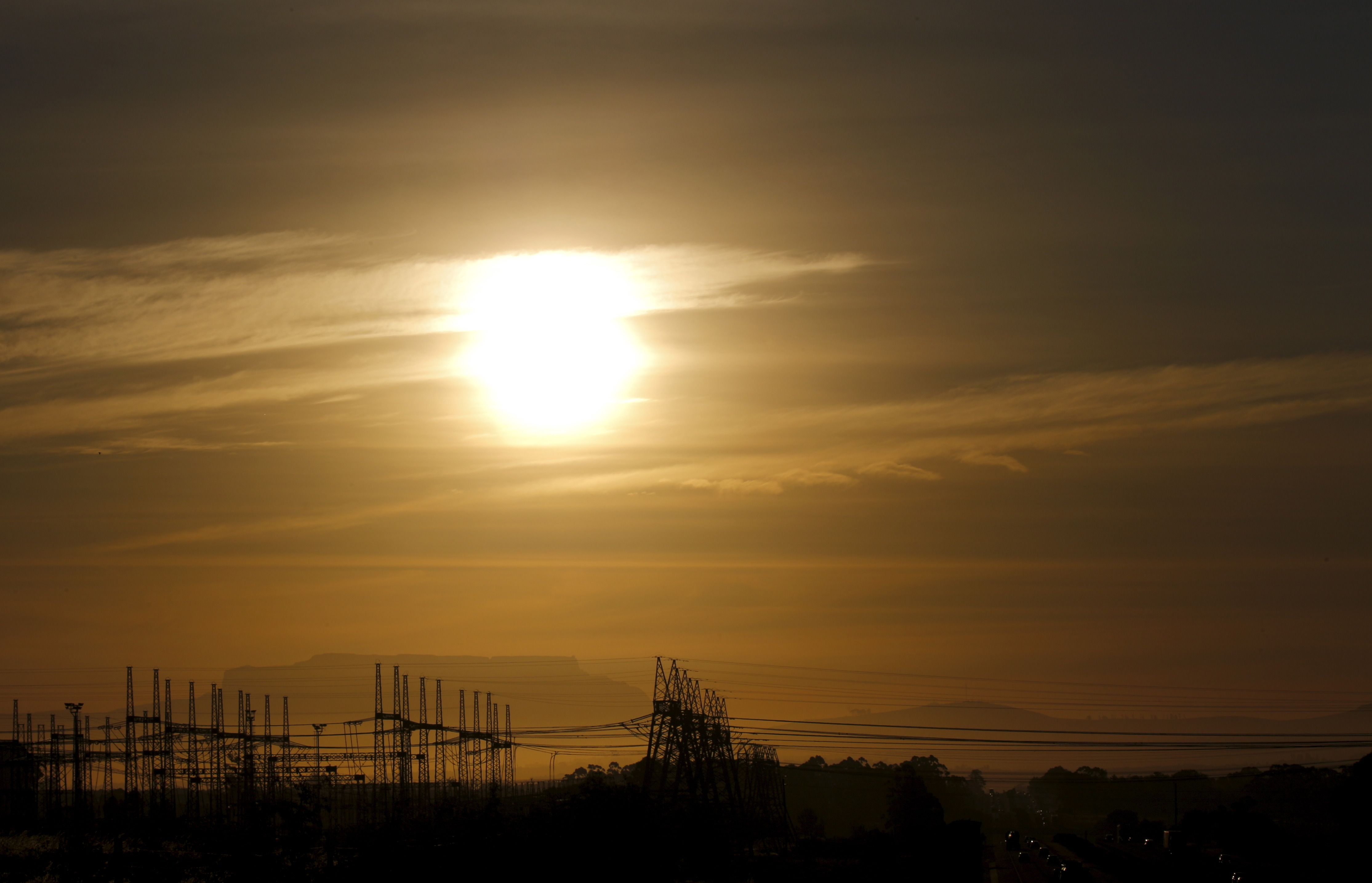 Pylons carry electricity from South African power utility Eskom’s Koeberg nuclear plant near Cape Town on Nov. 28, 2015.