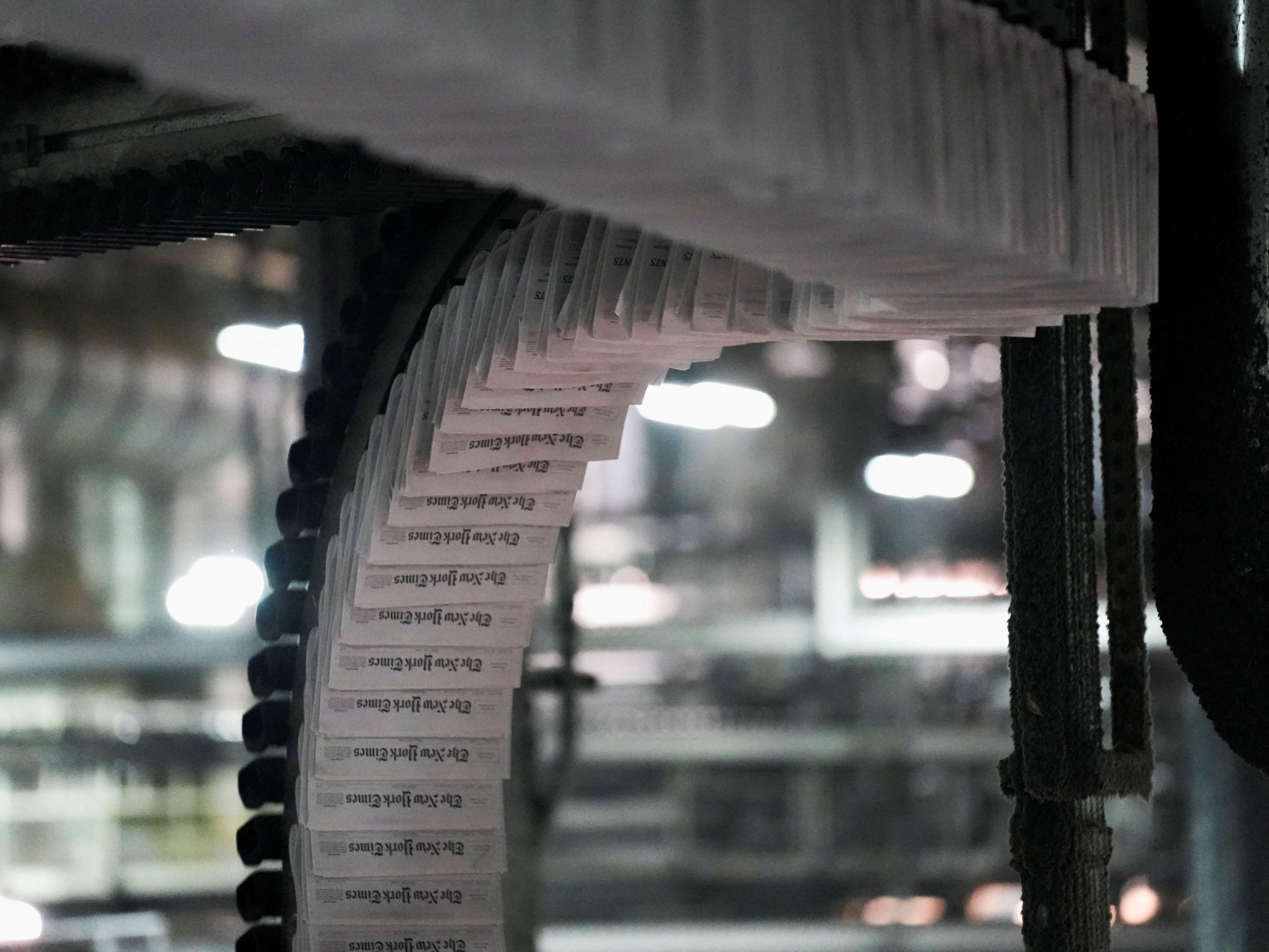 Copies of The New York Times being printed