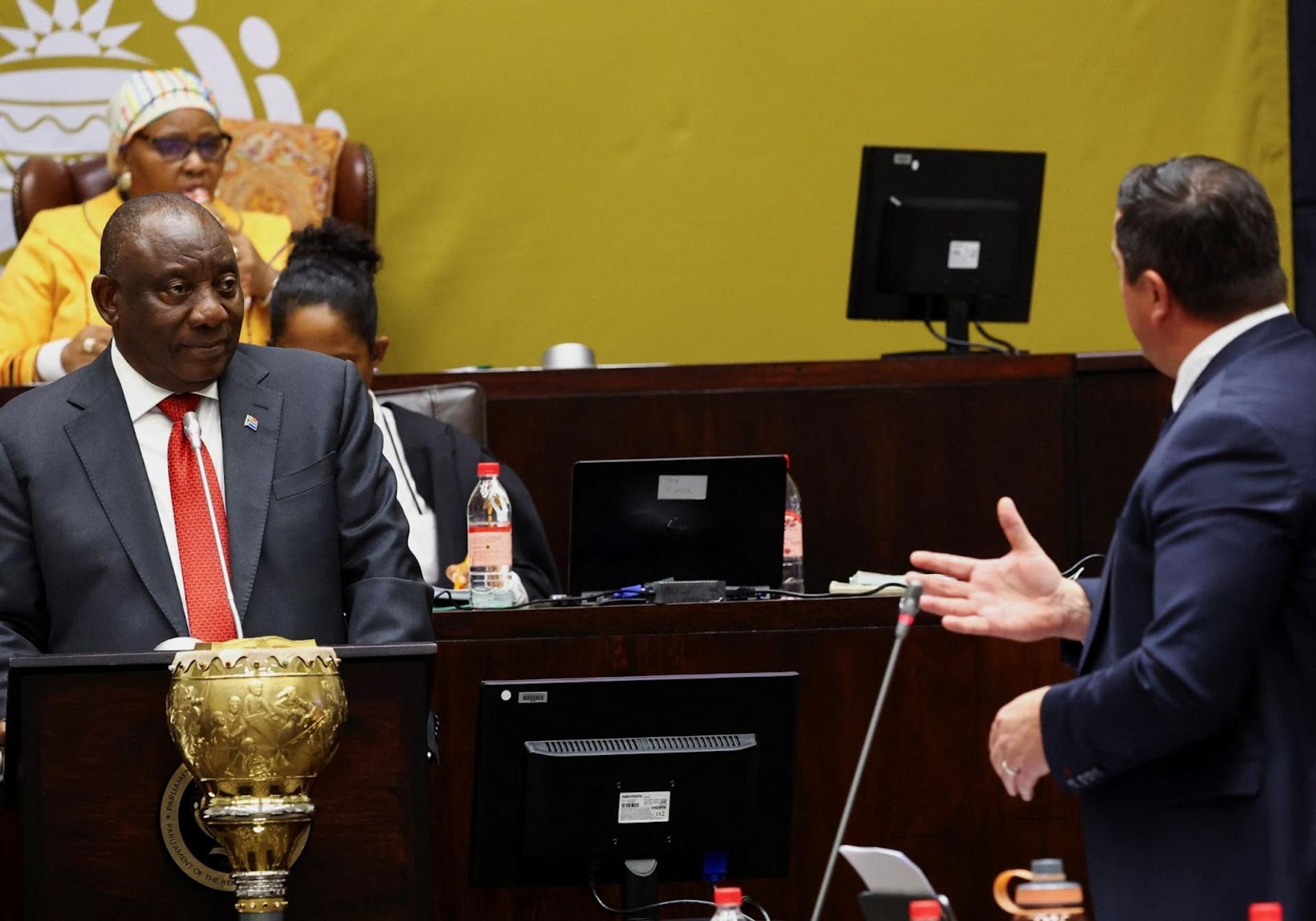 South African President Cyril Ramaphosa speaking to the leader of the Democratic Alliance. 