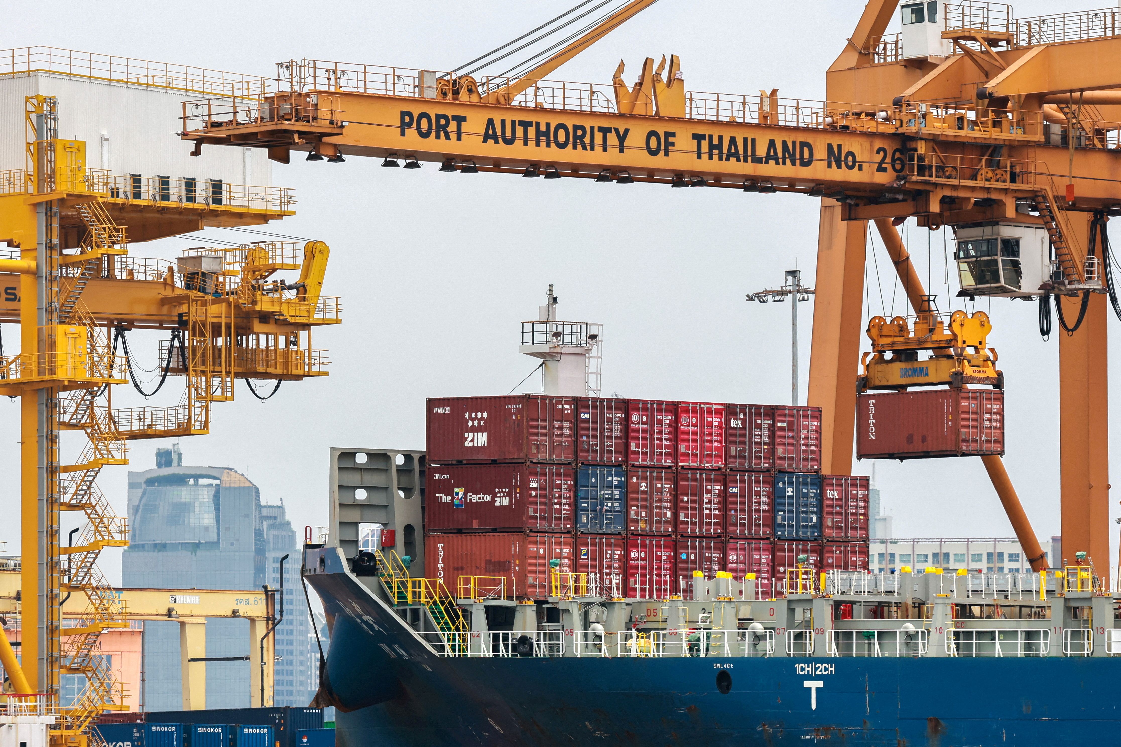 Cargo ships are loaded with containers as it is docked at the port of Bangkok, in Bangkok, Thailand, April 3, 2025. Thailand, with a tariff rate of 37 per cent imposed by U.S. President Donald Trump, is one of six countries in the Southeast Asian region slapped with much higher-than-expected tariffs by the U.S.