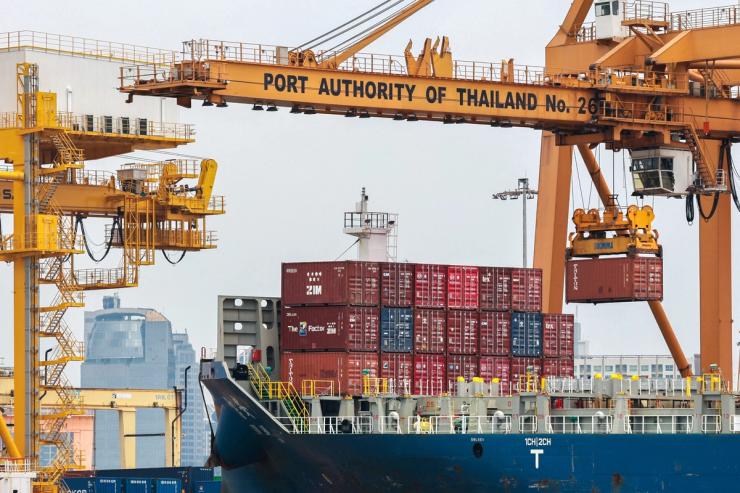 Cargo ships are loaded with containers as it is docked at the port of Bangkok, in Bangkok, Thailand, April 3, 2025. Thailand, with a tariff rate of 37 per cent imposed by U.S. President Donald Trump, is one of six countries in the Southeast Asian region slapped with much higher-than-expected tariffs by the U.S.
