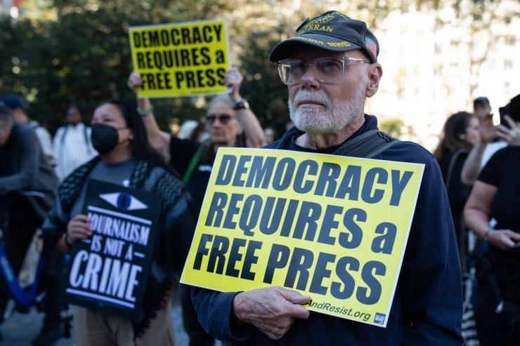 Americans take part in a press-led rally for first amendment protections.