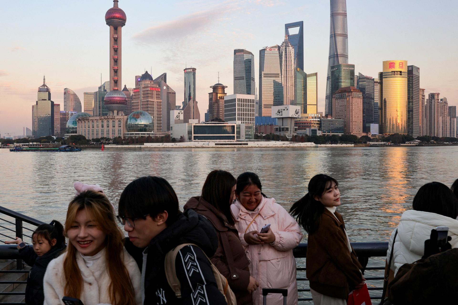 People hang out at The Bund in Shanghai.