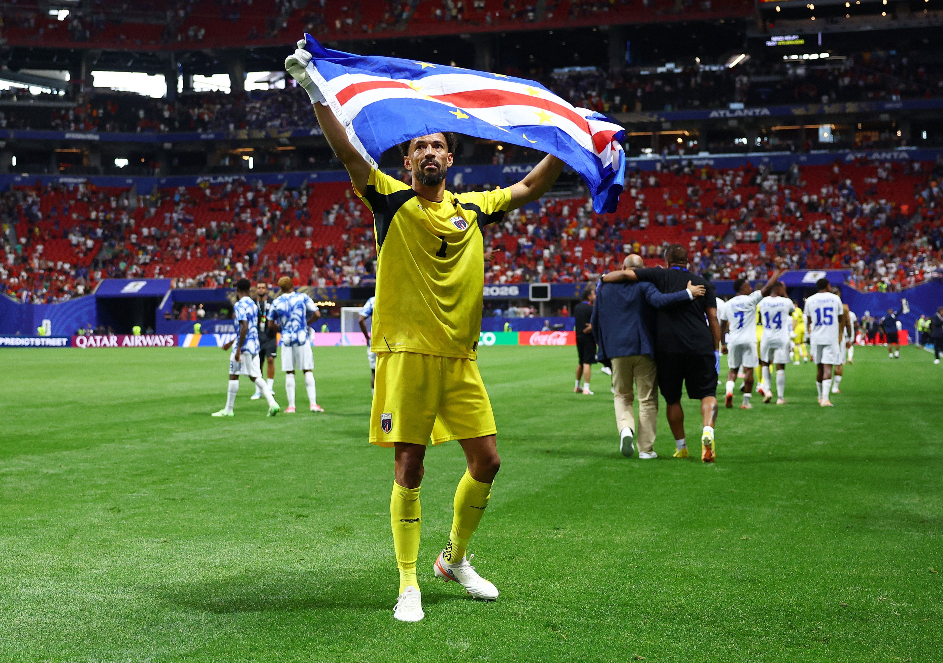 Cape Verde’s goalkeeper waves a flag following their 0-0 draw with Spain