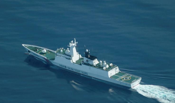 An aerial view of a China Coast Guard ship navigating near the disputed Scarborough Shoal
