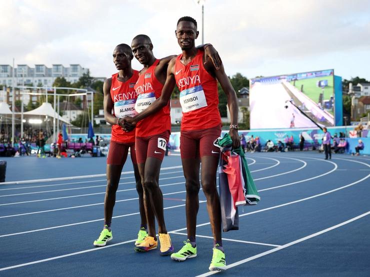 Kenya’s Mathew Kipchumba Kipsang celebrates after winning the Men’s 5000m Final with Kenya’s Cornelius Kemboi and Kenya’s Andrew Kiptoo at the Commonwealth Games.