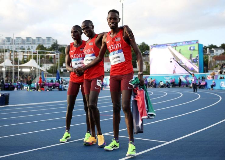 Kenya’s Mathew Kipchumba Kipsang celebrates after winning the Men’s 5000m Final with Kenya’s Cornelius Kemboi and Kenya’s Andrew Kiptoo at the Commonwealth Games.