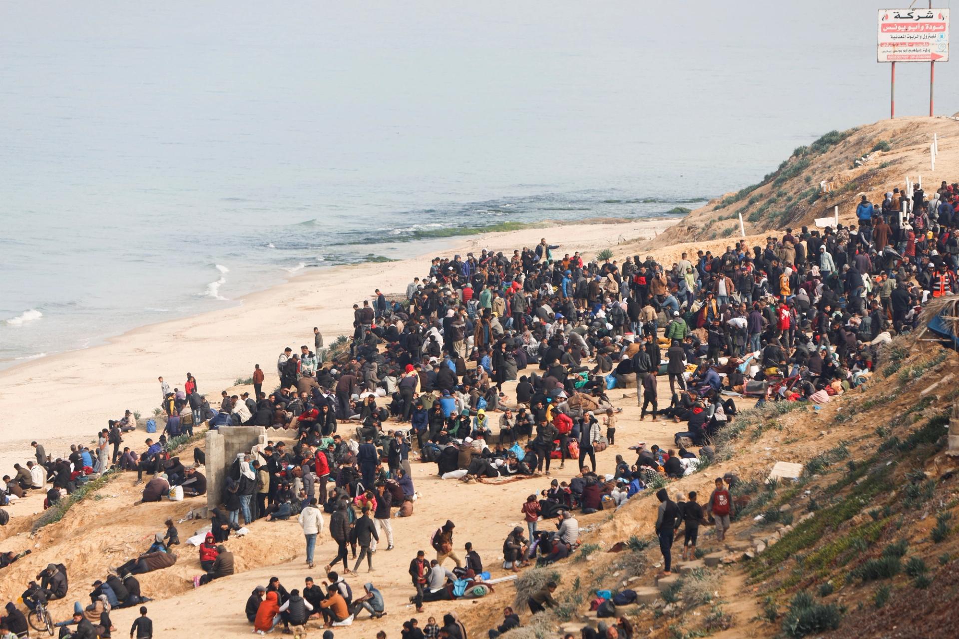 Palestinians wait to be allowed to return to their homes in northern Gaza.