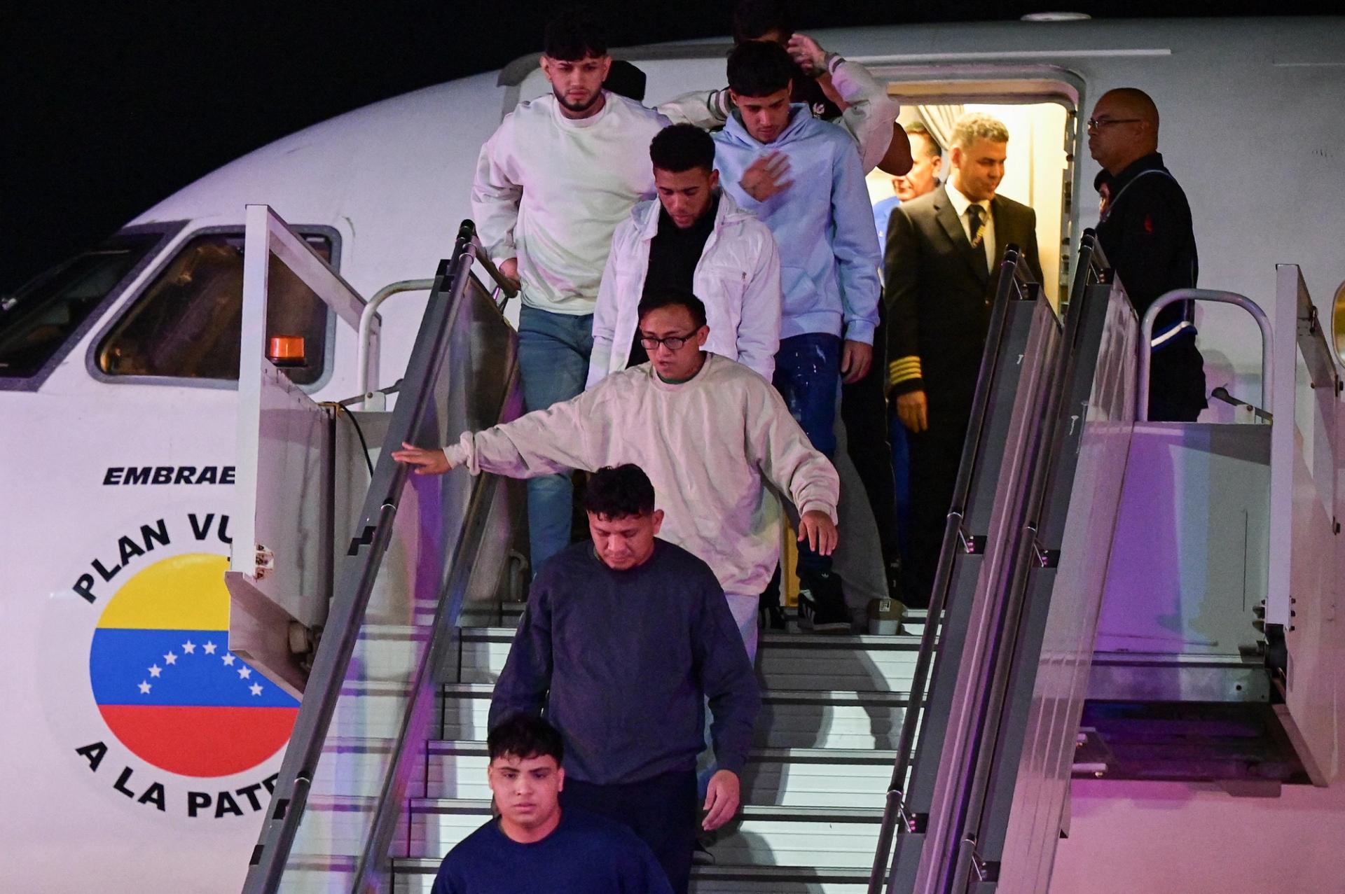 Venezuelan migrants arrive on a deportation flight from the US at the Simon Bolivar International airport in Venezuela