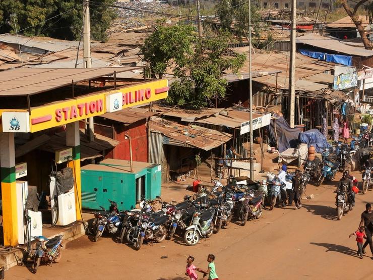 Motorcycles line up near a closed petrol station in Bamako.