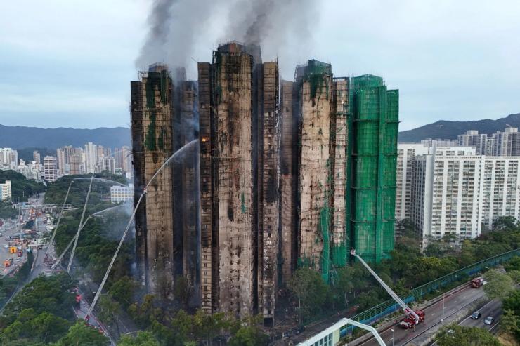 Smoldering Hong Kong apartment towers