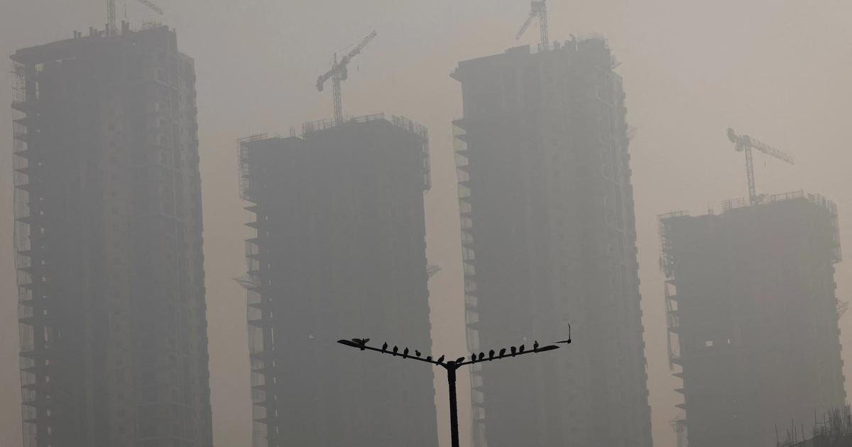 Fewer experts see climate change as global security threat, survey finds