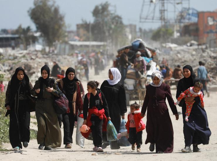 Palestinians in Gaza make their way to flee their homes.