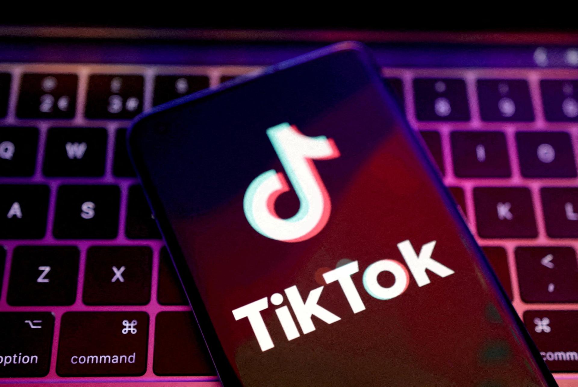 The TikTok logo displayed on a laptop keyboard. 