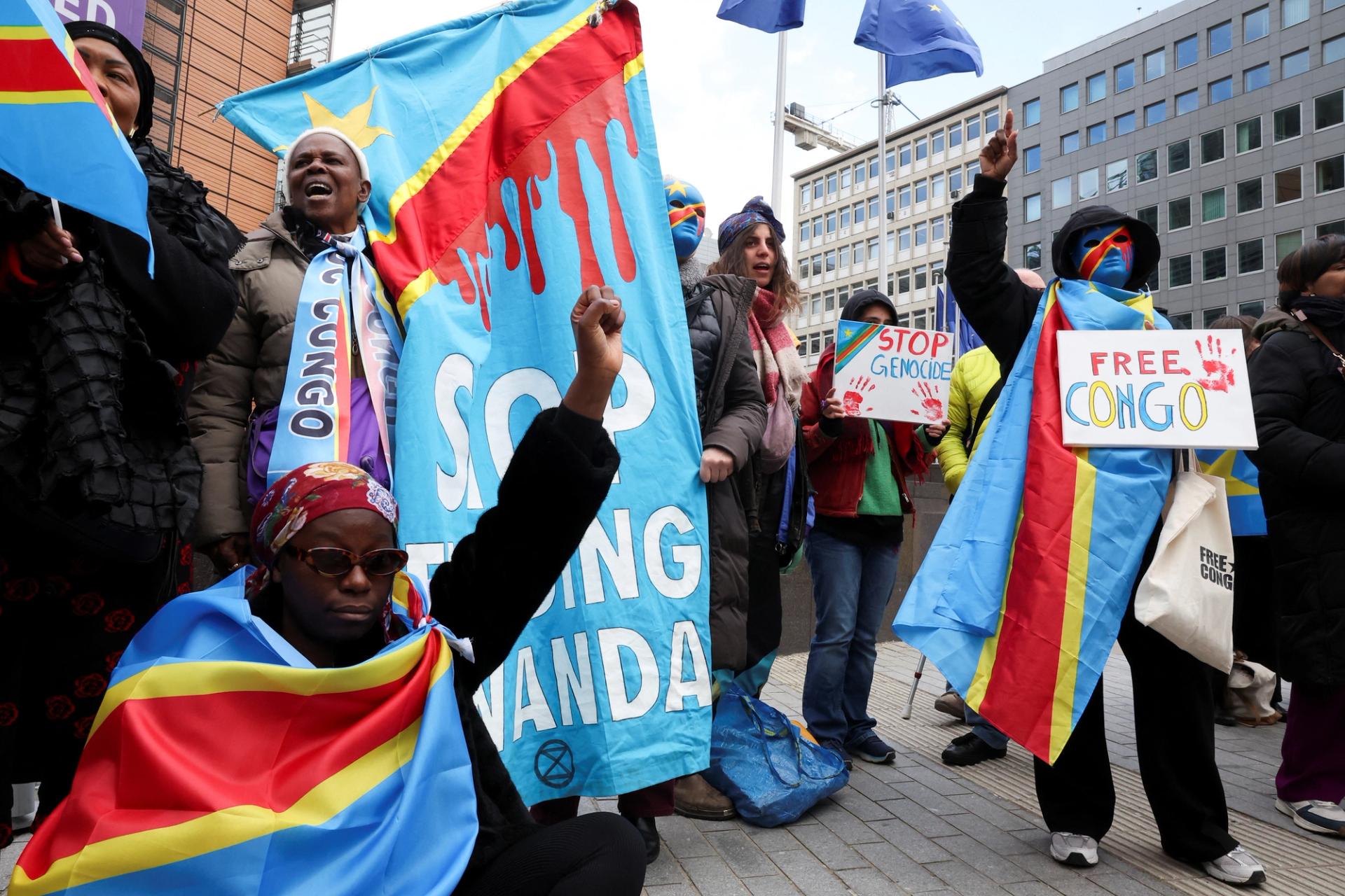 Congolese and Belgian citizens take part in a protest in Brussels.