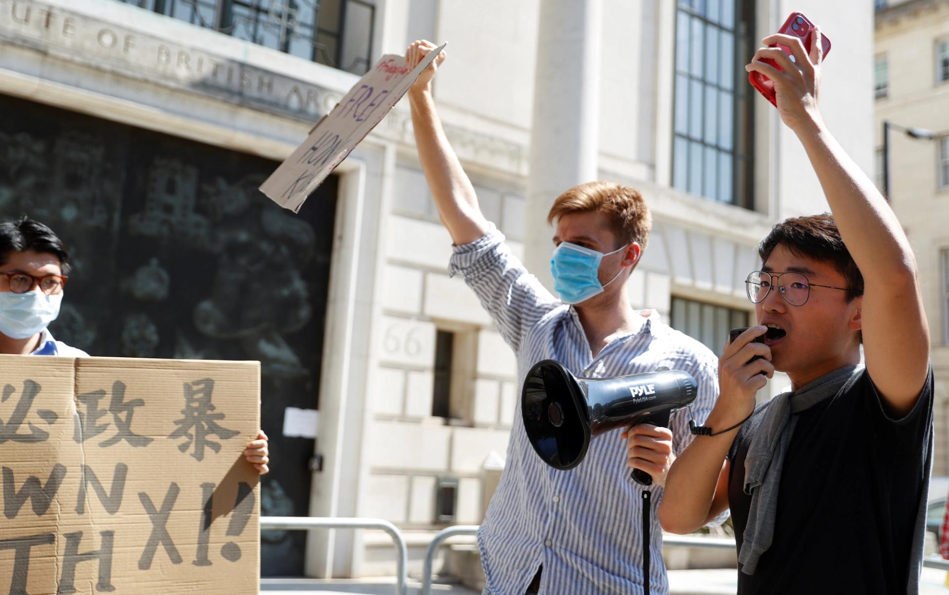 Pro-democracy demonstrators at China’s embassy in London. 