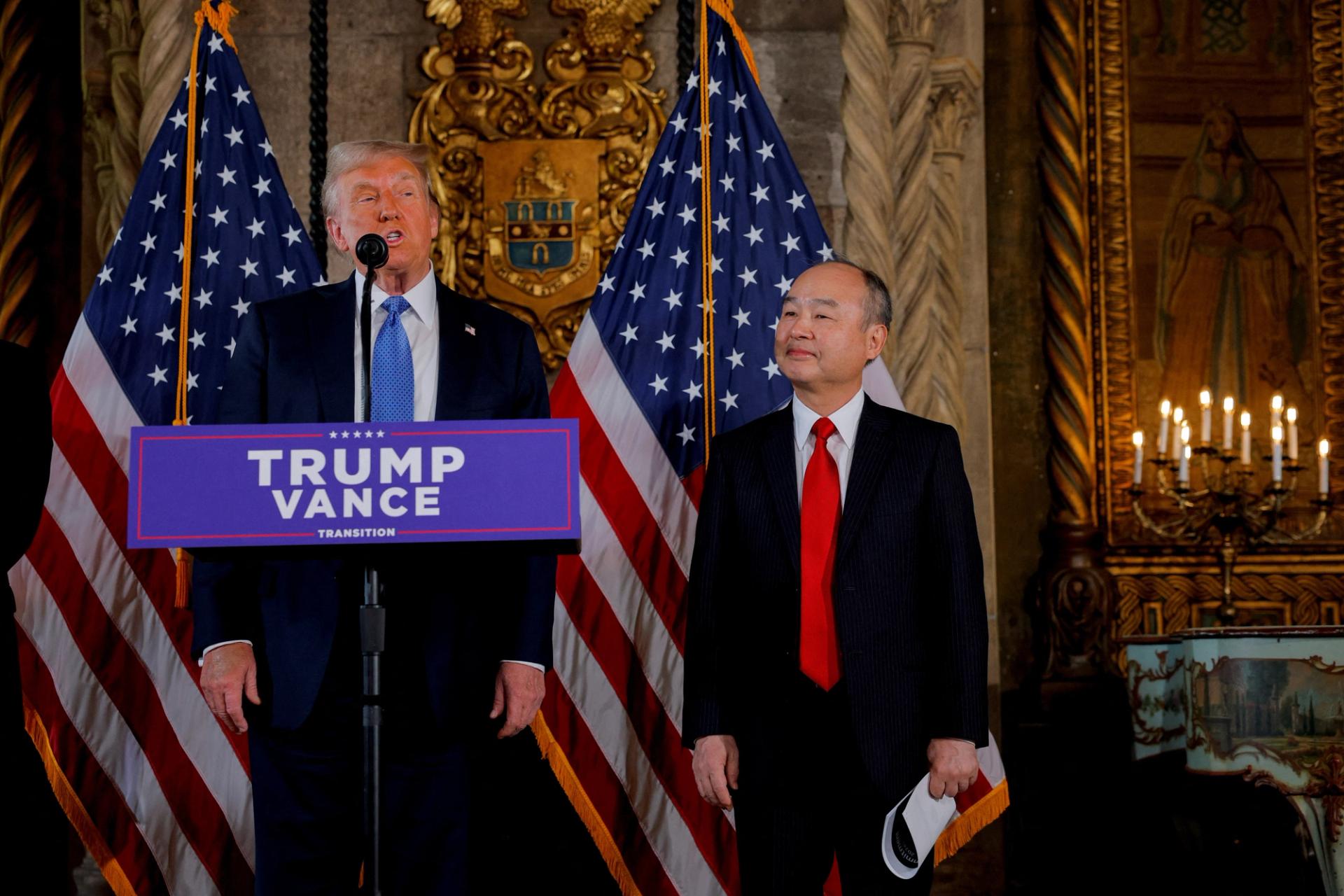 U.S. President-elect Donald Trump delivers remarks next to Chairman andCEO of SoftBank Masayoshi Son, at Mar-a-Lago in Palm Beach, Florida, U.S