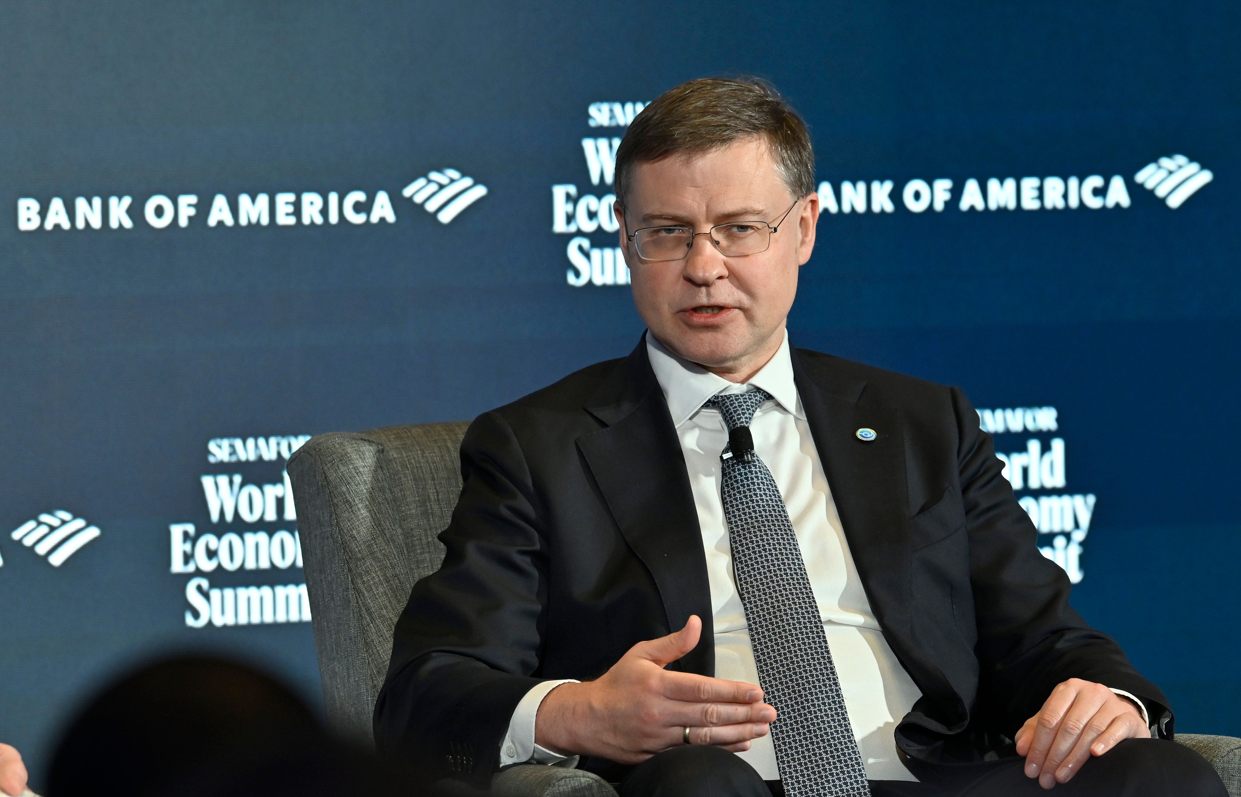Valdis Dombrovskis on stage. 