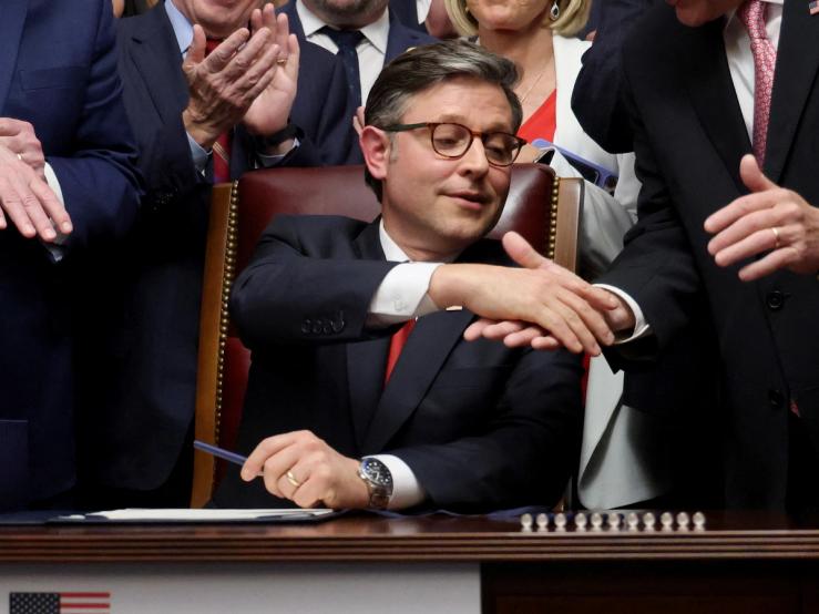 Mike Johnson shakes hands