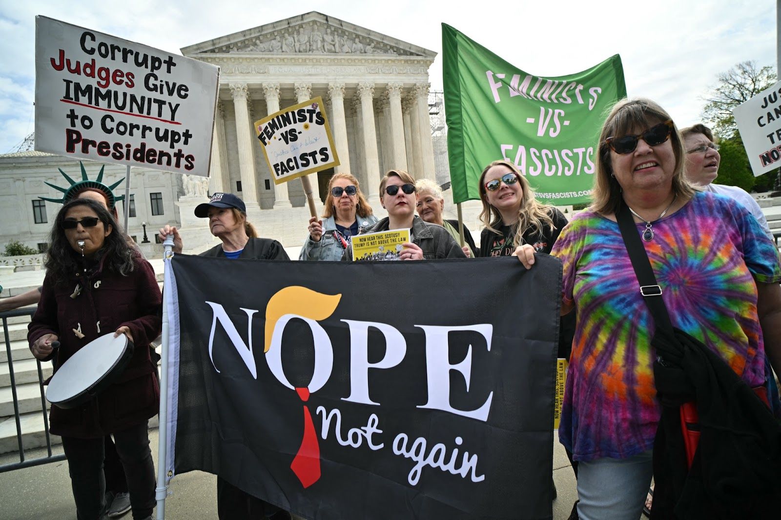 Anti-Trump protesters demonstrate outside the US Supreme Court on April 25, 2024.