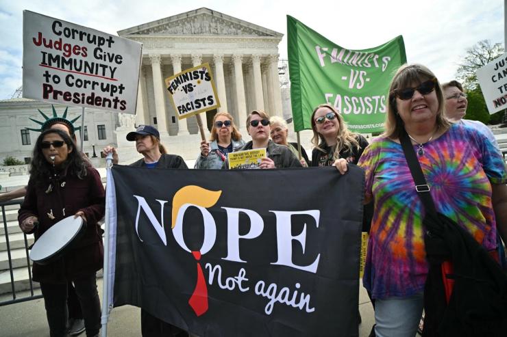 Anti-Trump protesters demonstrate outside the US Supreme Court on April 25, 2024.