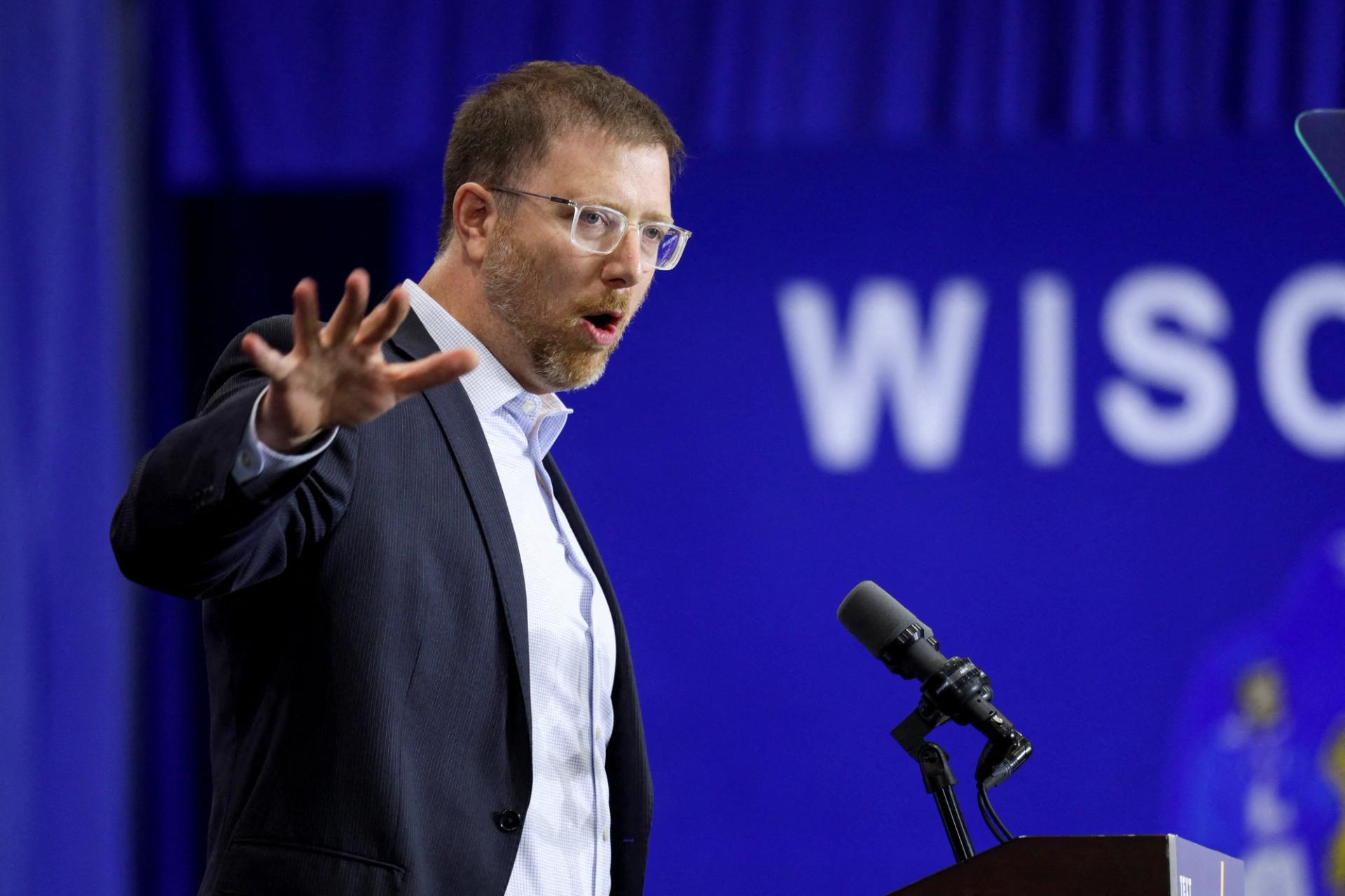 Ben Wikler speaks at a rally with former US President Barack Obama in 2022.