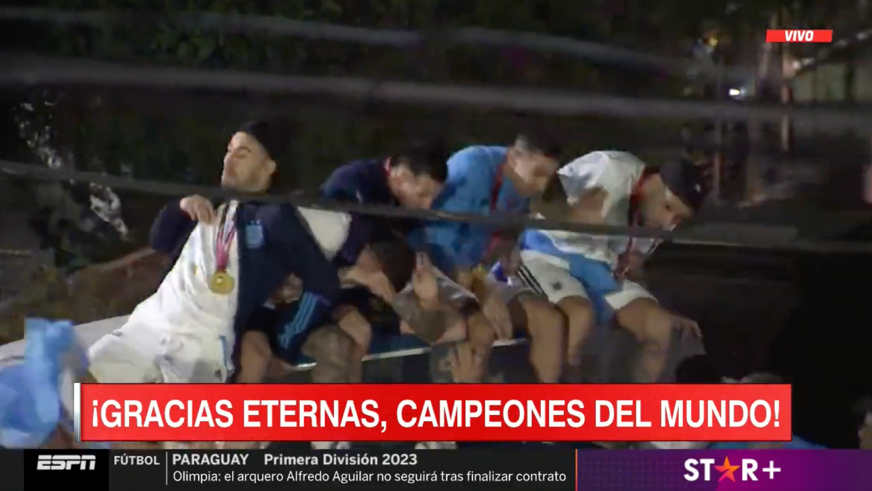 Watch Messi, teammates nearly knocked off bus during World Cup parade