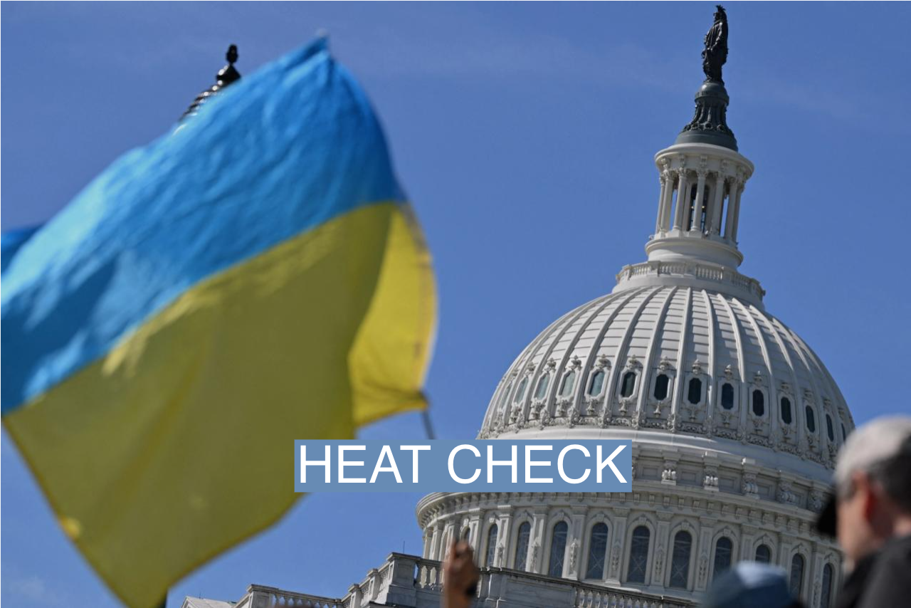 Activists wave Ukrainian flags outside the US Capitol in Washington, D.C., on April 23, 2024.
