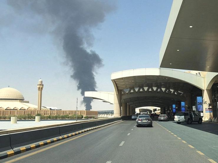 Large plume of black smoke rises from the King Khalid International Airport in Saudi Arabia.