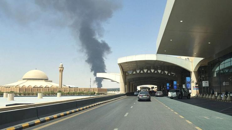 Large plume of black smoke rises from the King Khalid International Airport in Saudi Arabia.