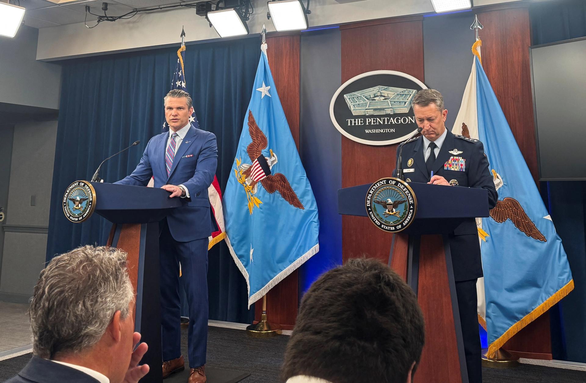 Defense Secretary Pete Hegseth and Chairman of the Joint Chiefs of Staff Air Force General Dan Caine speak during a press conference 
