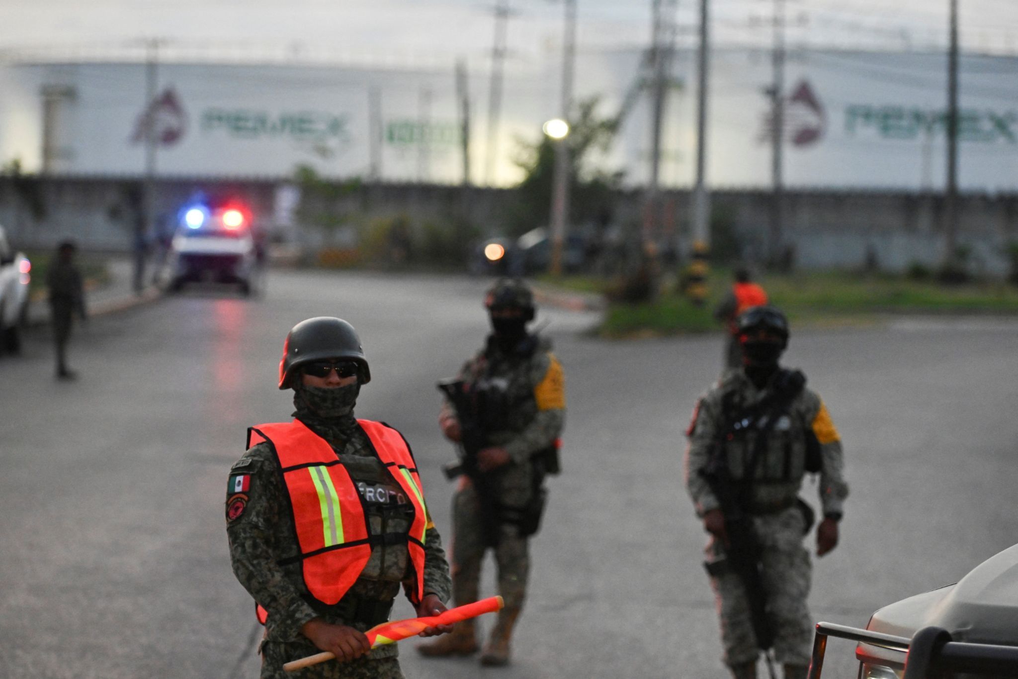 A photo of Mexican army members. 