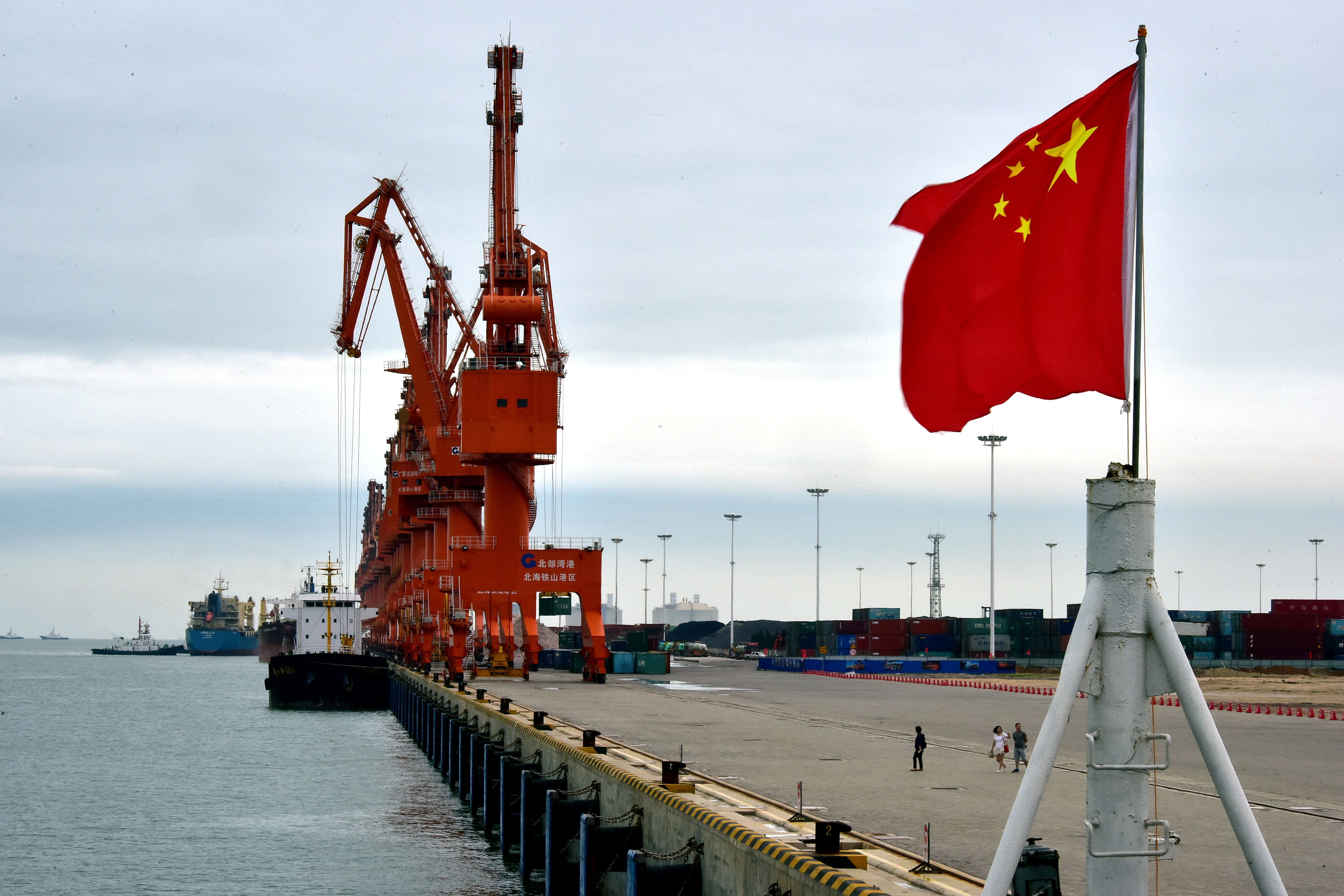 A Chinese national flag flies at a port in Beihai, Guangxi autonomous region.