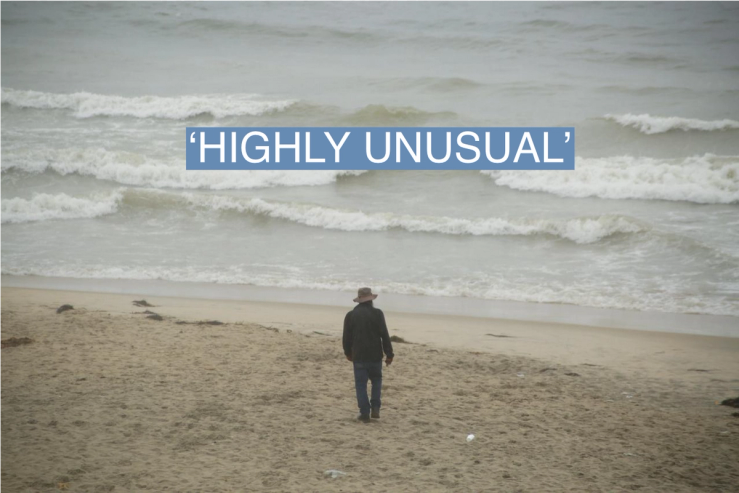 A man looks at the sea on the beach as Tropical Storm Hilary hits Baja California state, in Tijuana, Mexico August 20, 2023.