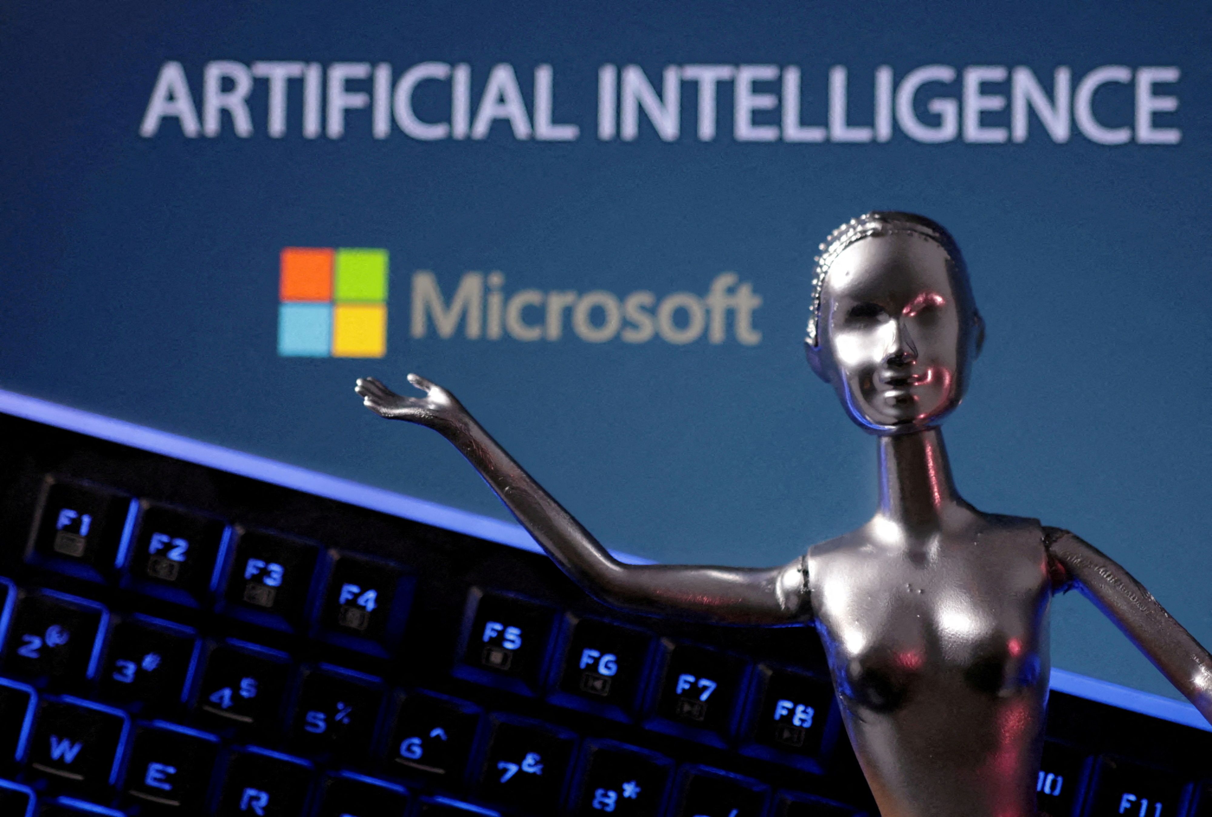 Microsoft logo and the words ‘artificial intelligence’
