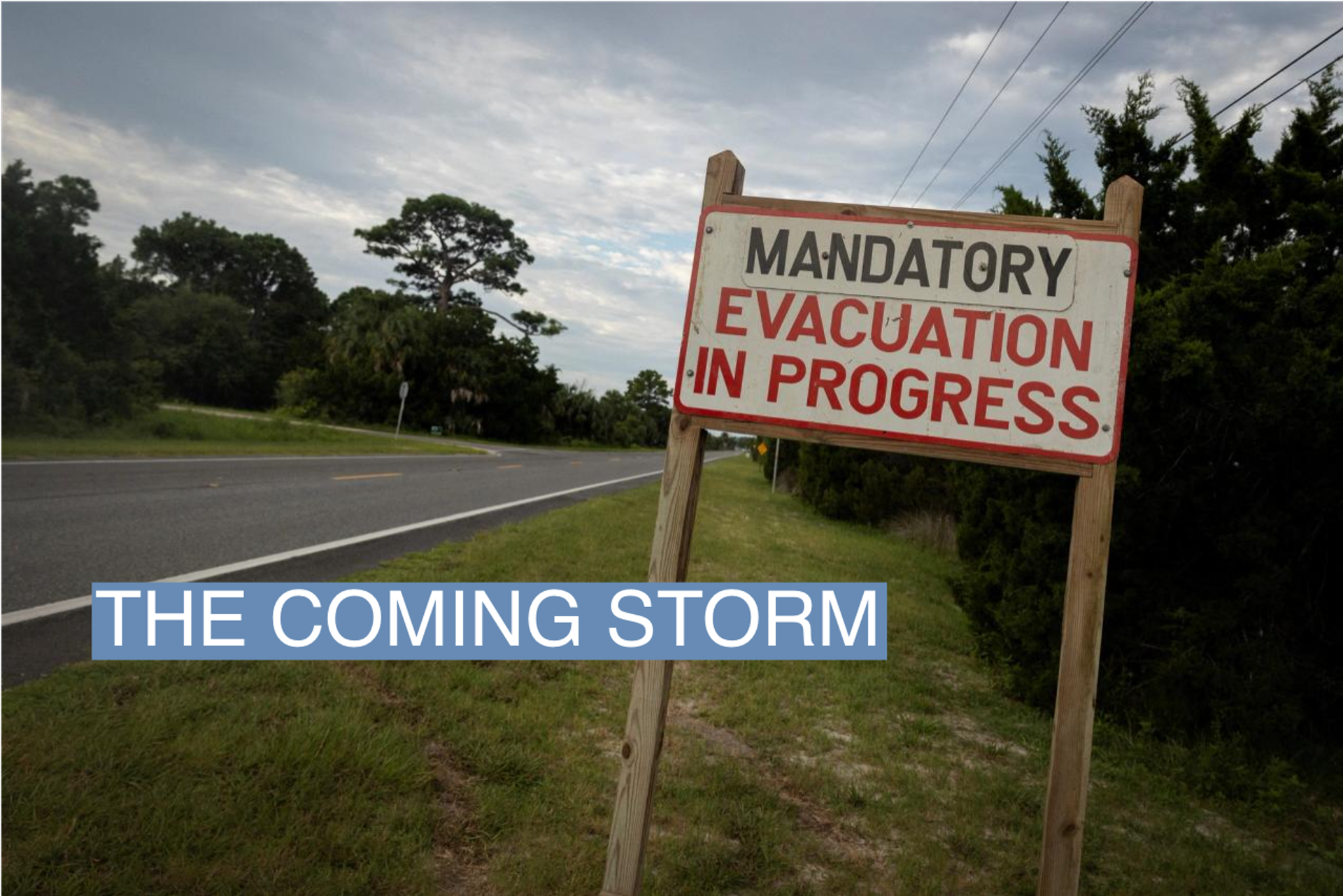 A mandatory evacuation sign is seen ahead of the arrival of Hurricane Idalia, in Cedar Key, Florida, U.S., August 29, 2023. REUTERS/Marco Bello