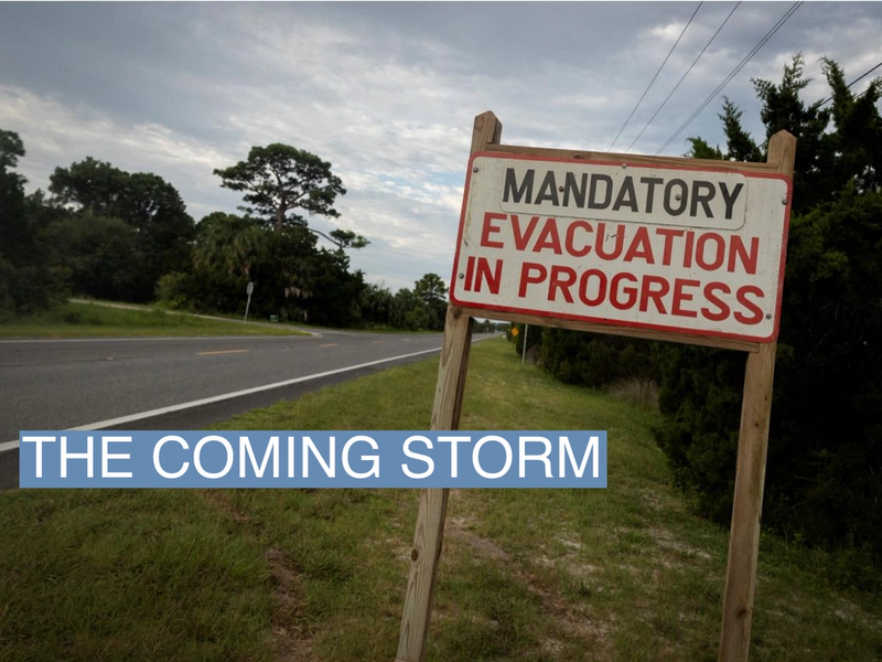 A mandatory evacuation sign is seen ahead of the arrival of Hurricane Idalia, in Cedar Key, Florida, U.S., August 29, 2023. REUTERS/Marco Bello