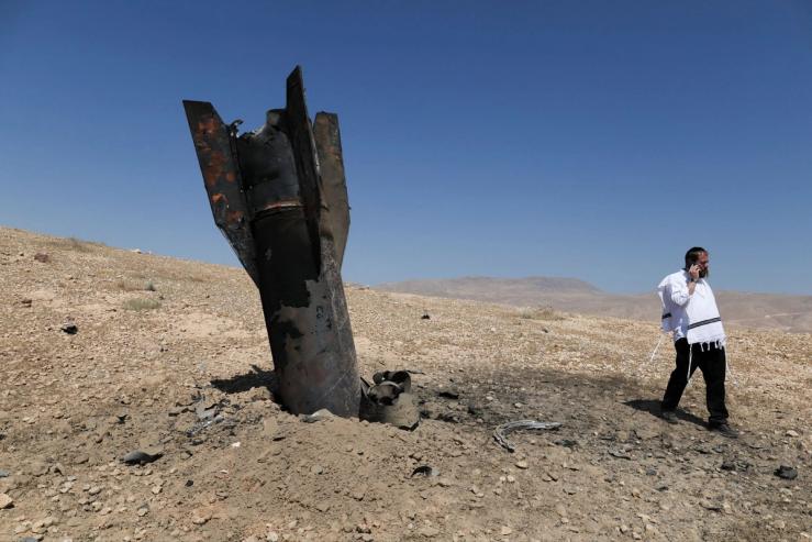 A missile protruding from the ground in Israel.