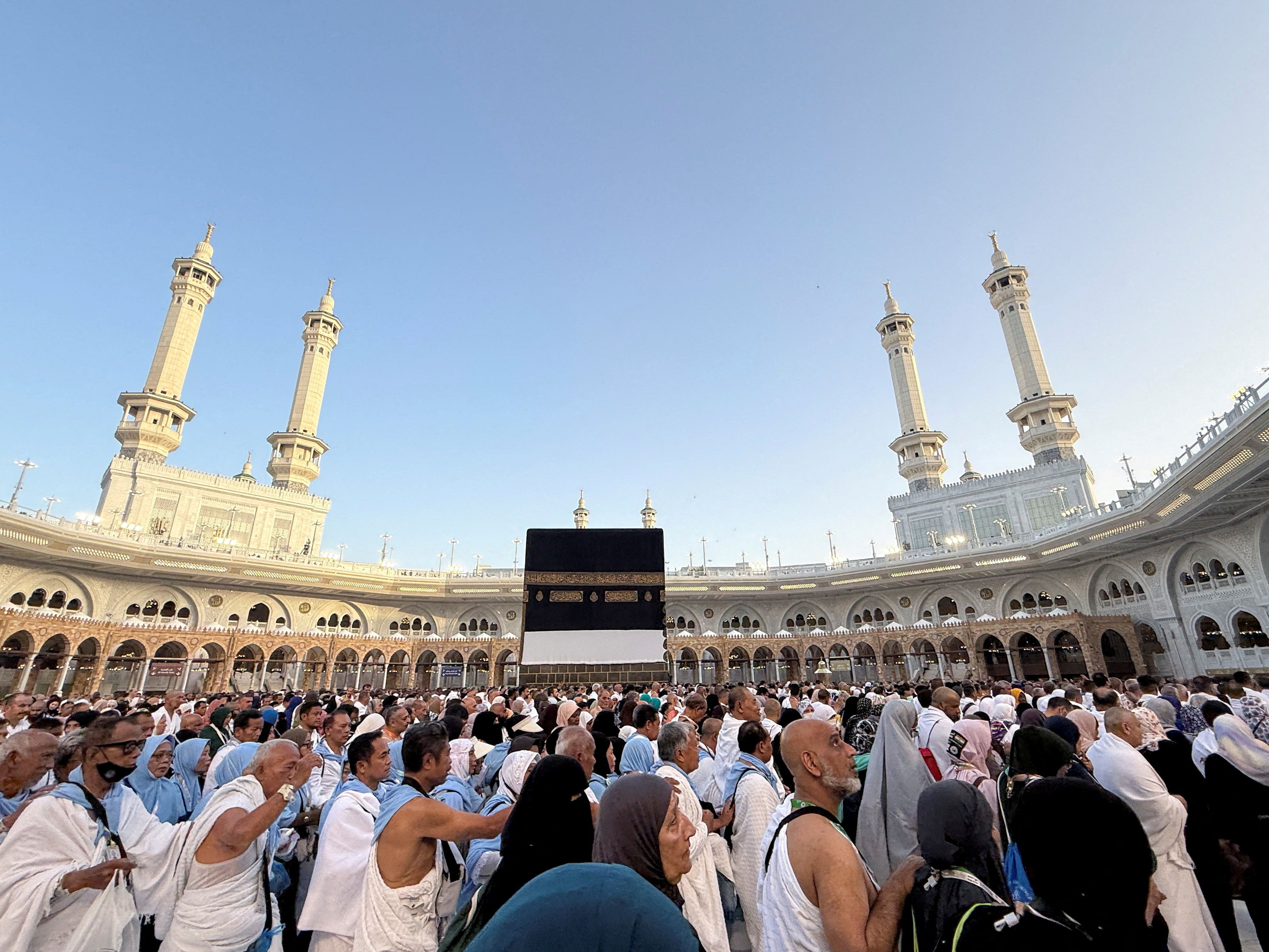 Muslim pilgrims circle the Kaaba and pray at the Grand Mosque, ahead of the annual hajj pilgrimage.