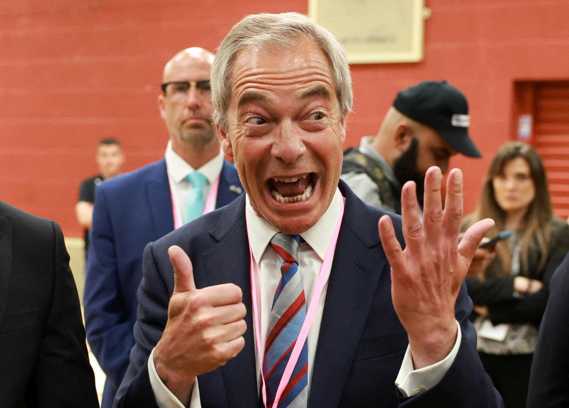 Reform UK leader Nigel Farage reacts to his party winning a byelection. 
