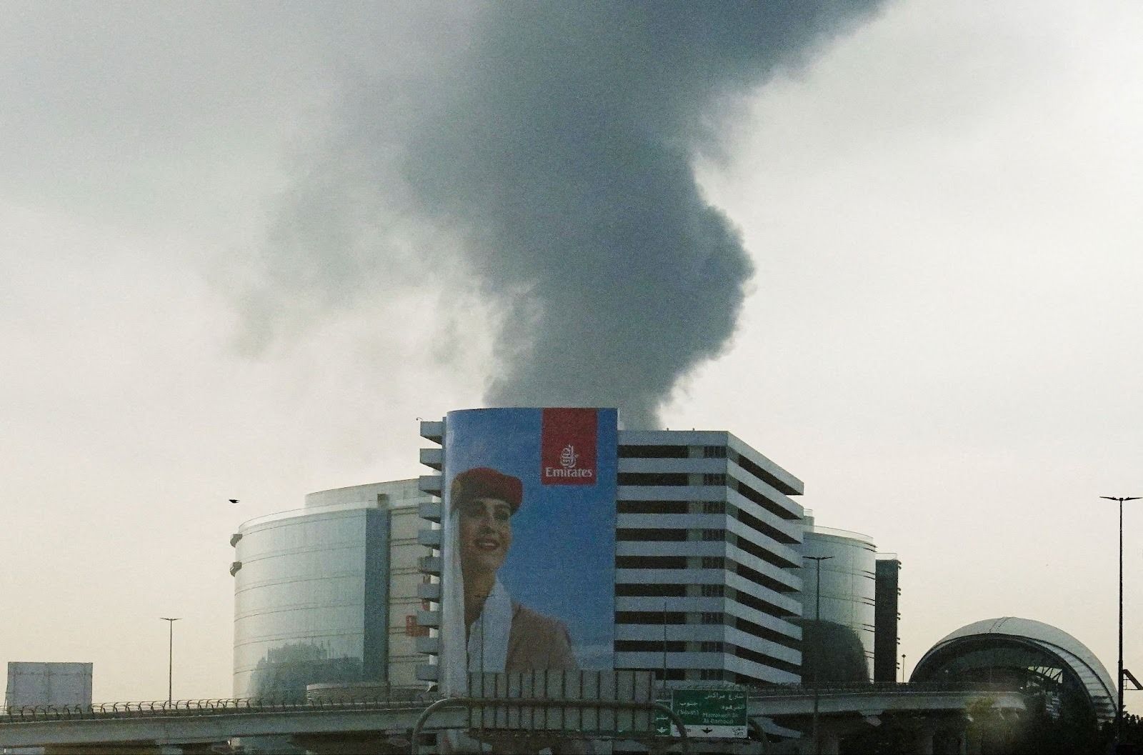 Smoke rises from Dubai International Airport.
