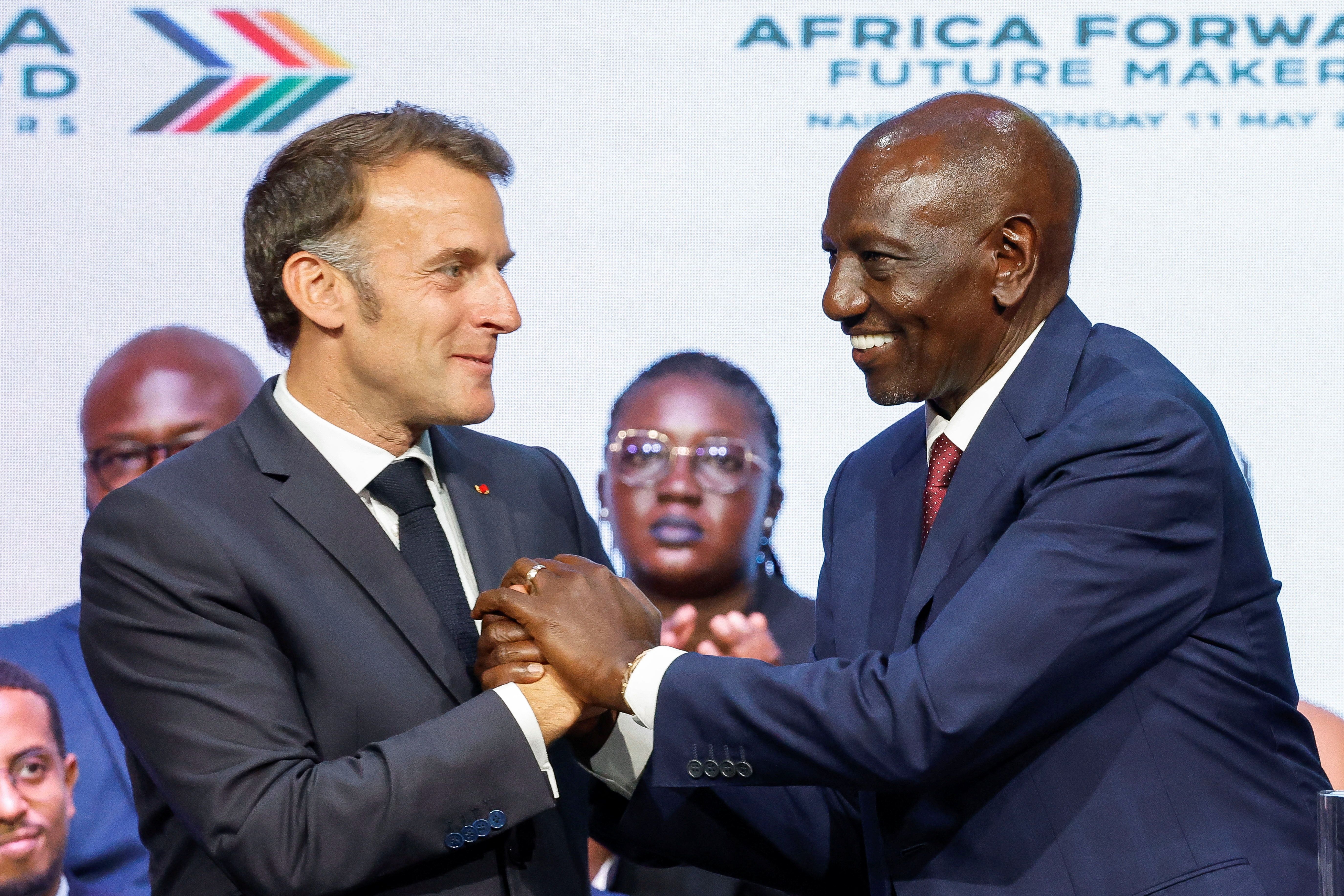French President Emmanuel Macron and Kenya’s President William Ruto shake hands during the “Africa Forward Summit 2026 in Nairobi, Kenya, May 11, 2026. 
