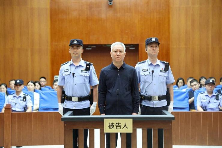 Hui Ka Yan, the founder of China’s Evergrande Group stands in court at the Shenzhen Intermediate People’s Court, in Shenzhen, Guangdong province, China in this handout image release by Shenzhen Intermediate People’s Court