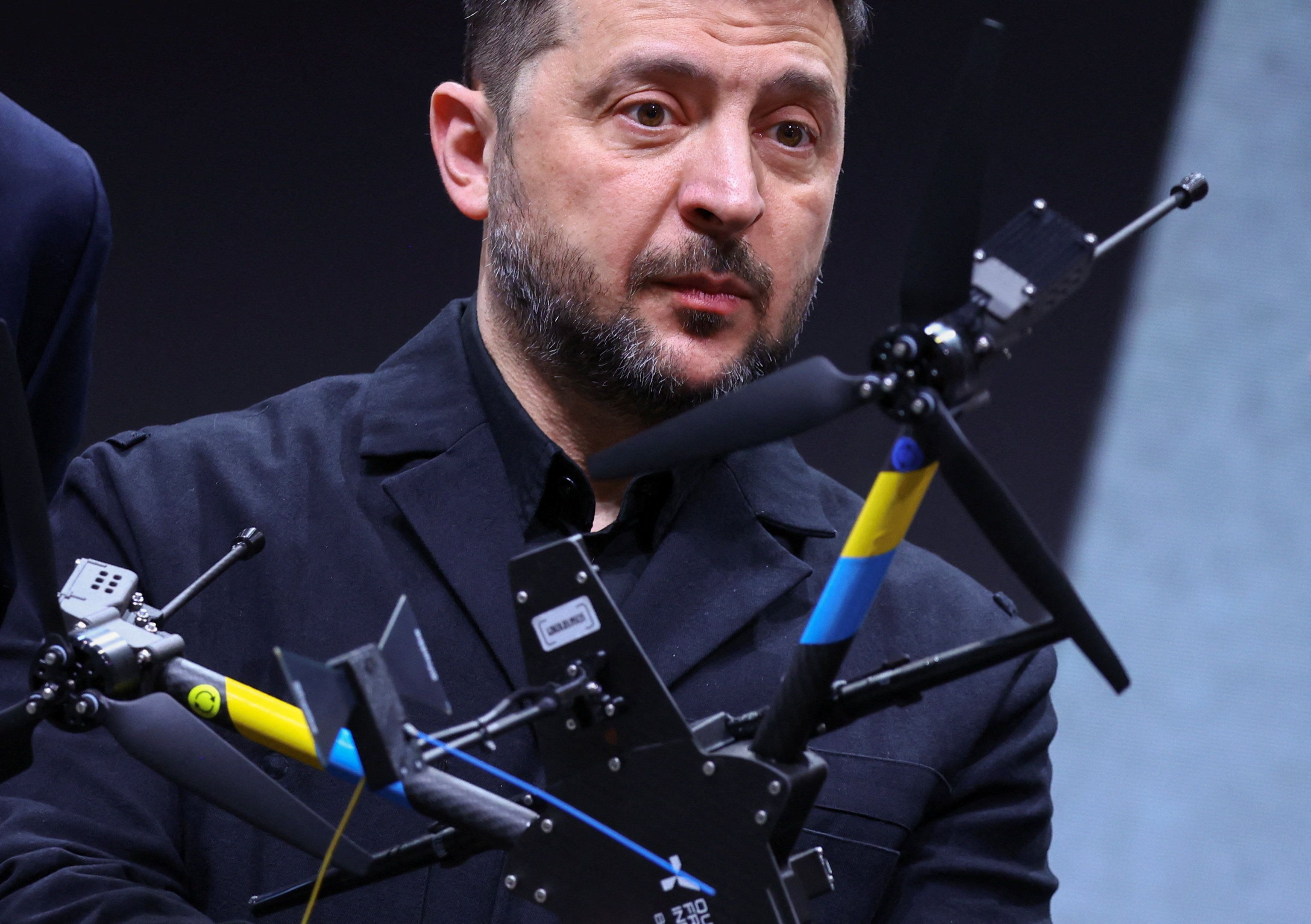 Zelenskyy looking at a drone. 