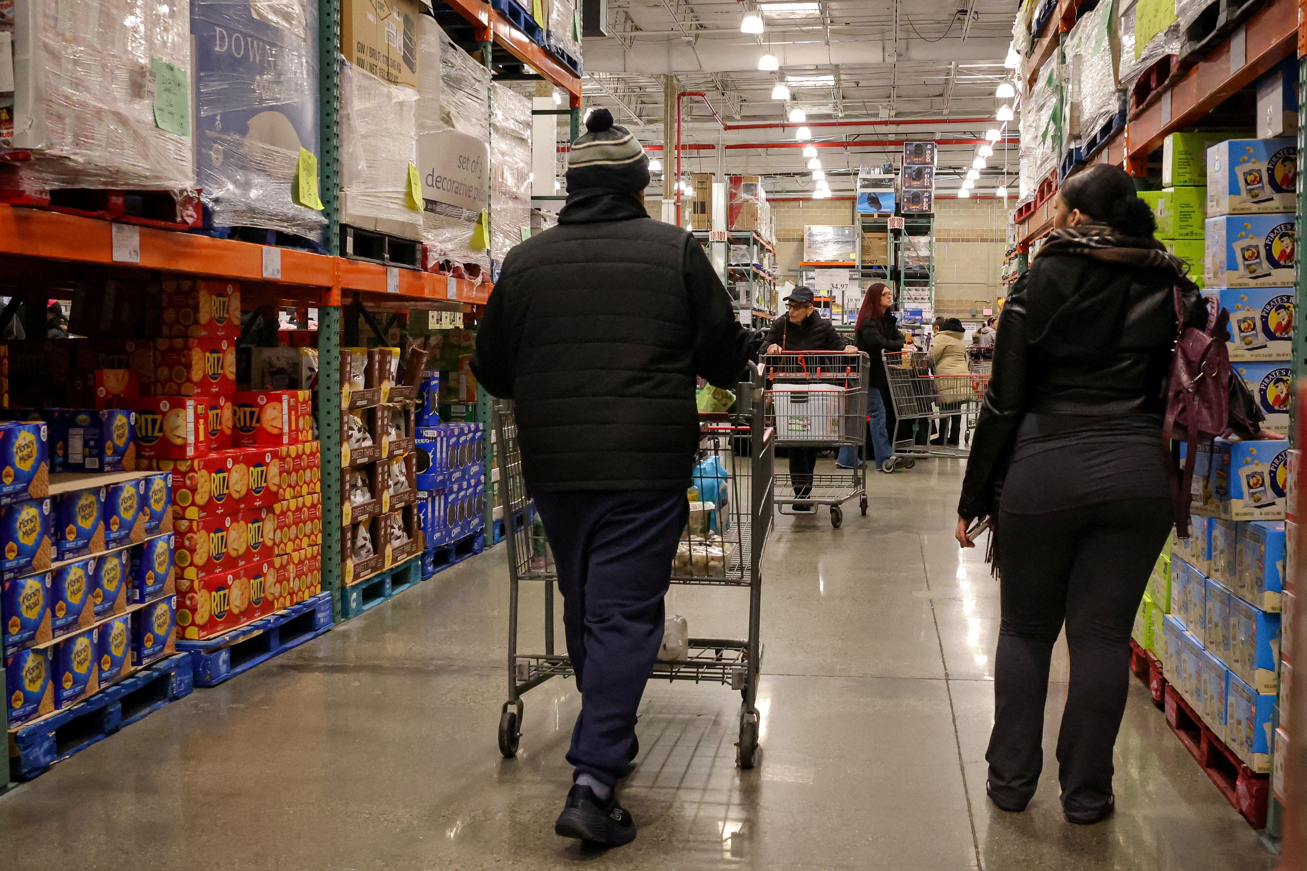 People shop at a Costco store in the Staten Island borough of New York City