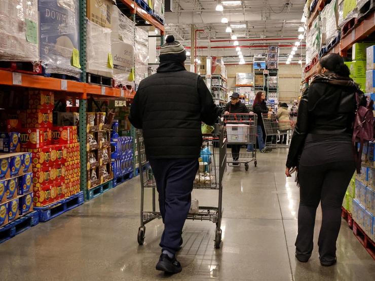 People shop at a Costco store in the Staten Island borough of New York City
