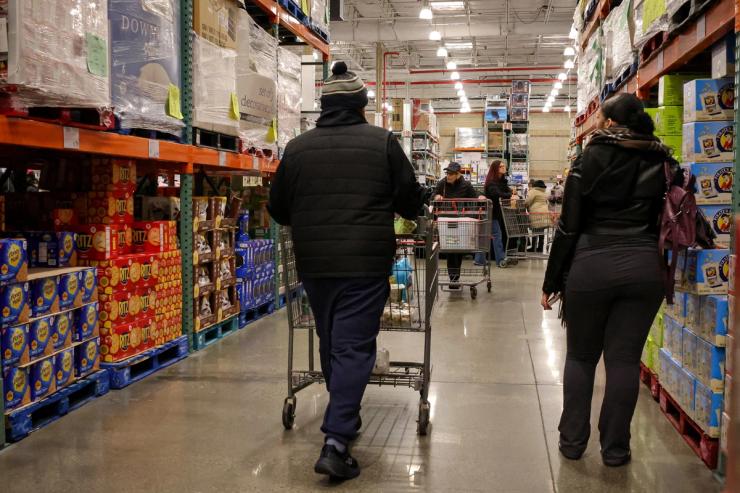 People shop at a Costco store in the Staten Island borough of New York City