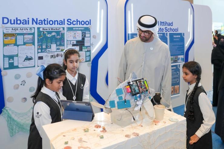 Emirati students pictured with Sultan Al Jaber, UAE’s minister of industry and advanced tech.