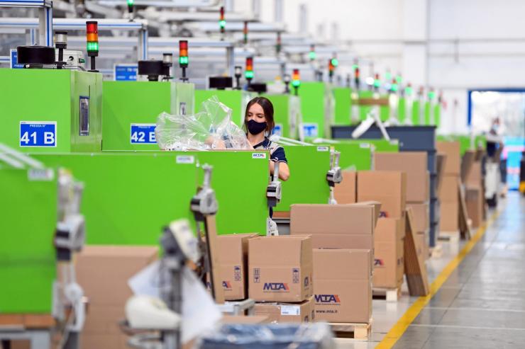 Worker at an MTA factory in Italy