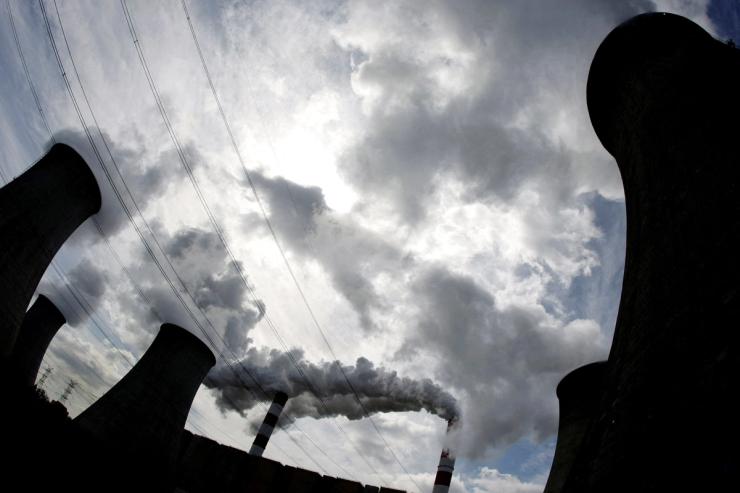 Smoke bellow from the chimneys of Poland’s Belchatow Power Station, Europe’s largest biggest coal-fired power plant, in this May 7, 2009. REUTERS/Peter Andrews/File Photo